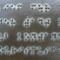 Impression Welt-Braille-Tag